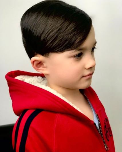Side Combed Wet Look Hair For a Young Boy