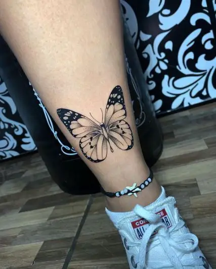 Single Black Butterfly Tattoo on Leg