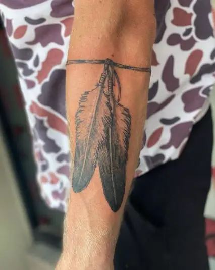 Eagle Feathers and a Band Tattoo