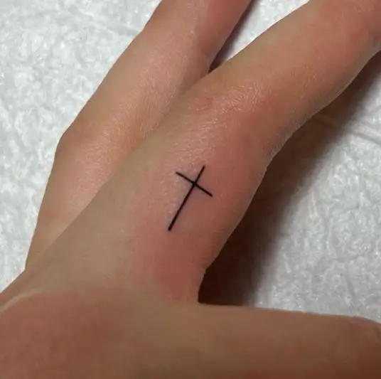 Tiny Cross On The Side of the Finger