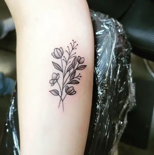 Tiny Floral Tattoo