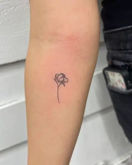 Tiny Rose Bud Tattoo