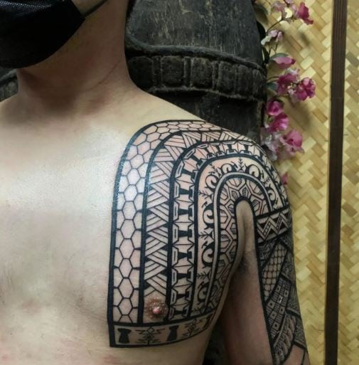Traditional Half Sleeve and Half Chest Tattoo