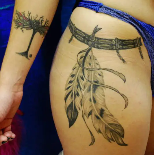 Twin Eagle Feather Tied To Belt Tattoo
