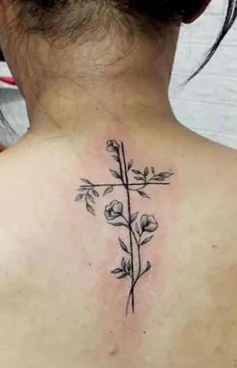 Twin Flower Cross Tattoo Behind the Neck