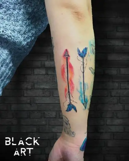 Water Colored Feather Arrow Tattoo