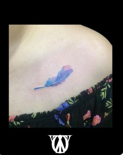 Water Colored Feather Tattoo On Chest