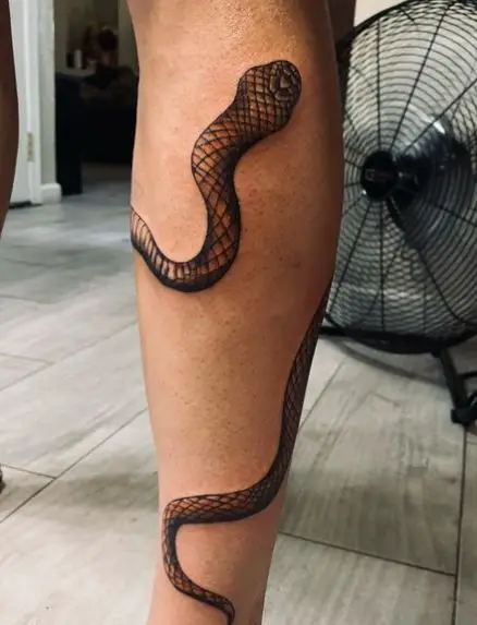 Wrap around snake tattoo