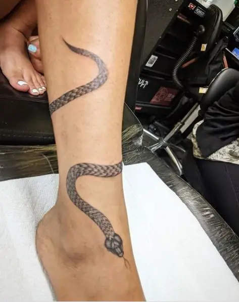 small snake wrap around tattoo