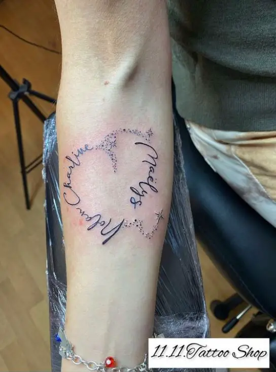 big heart tattoo with 3 names