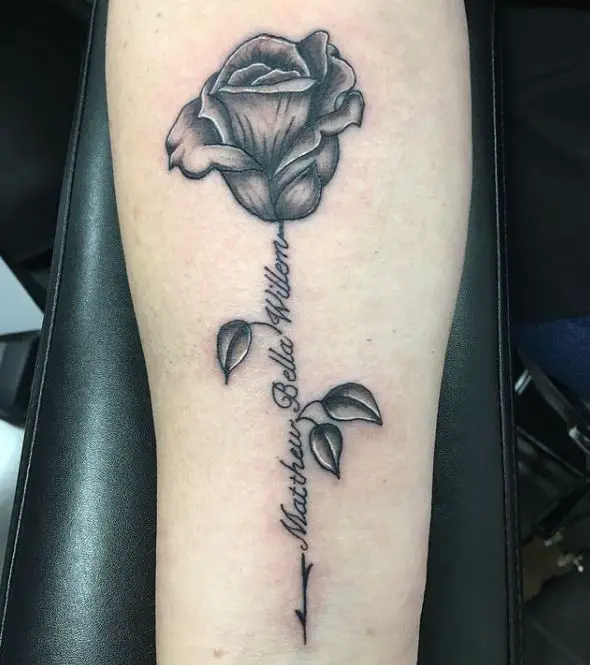 black rose and names tattoo