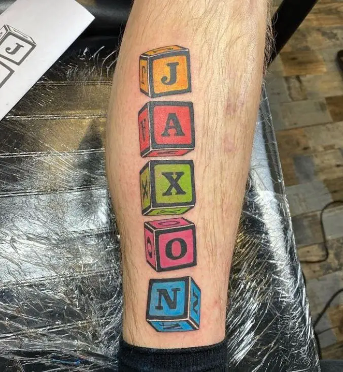 colourful alphabet blocks tattoo