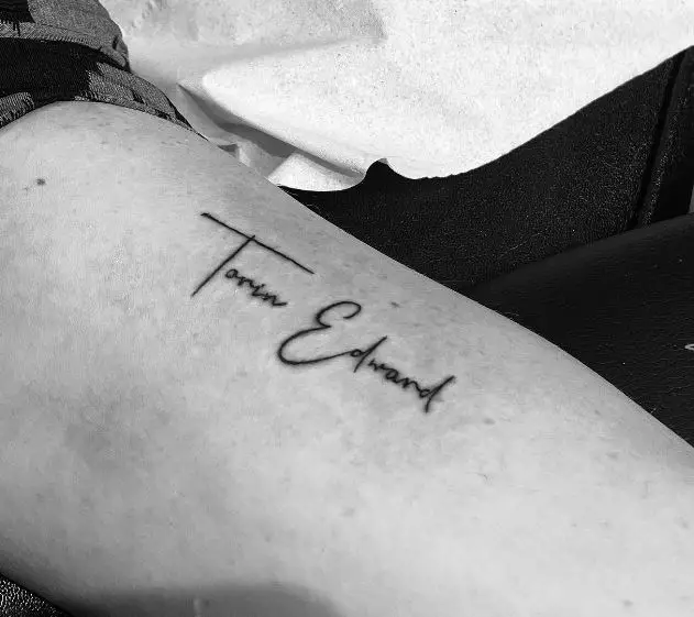 fine line script name tattoo