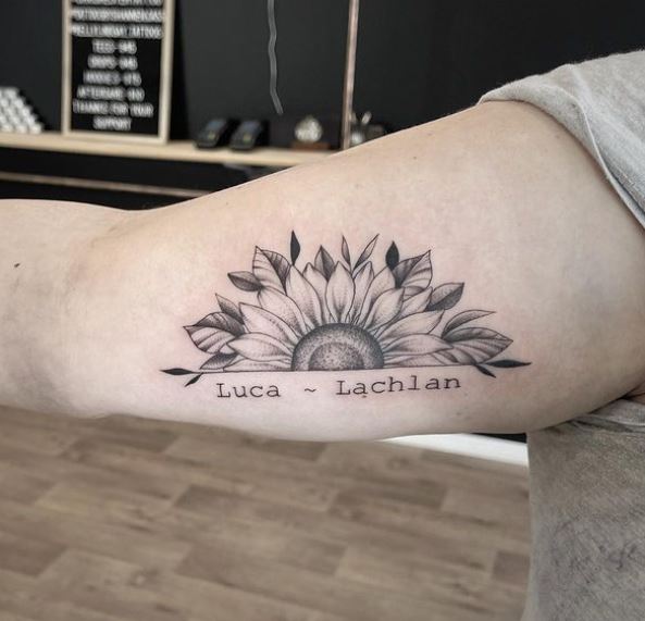 half sunflower tattoo with names