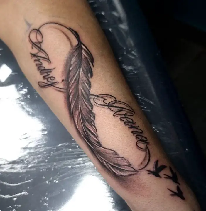 large infity sign tattoo with feather and names