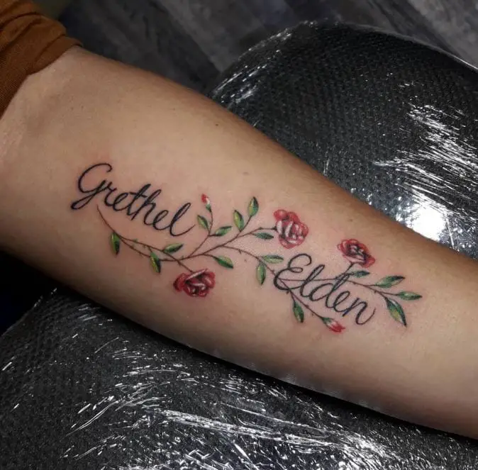 minimal name and roses tattoo