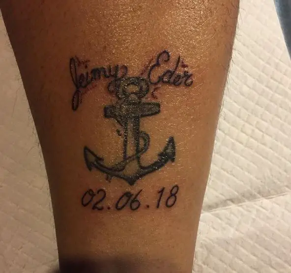 name, birth date and anchor tattoo