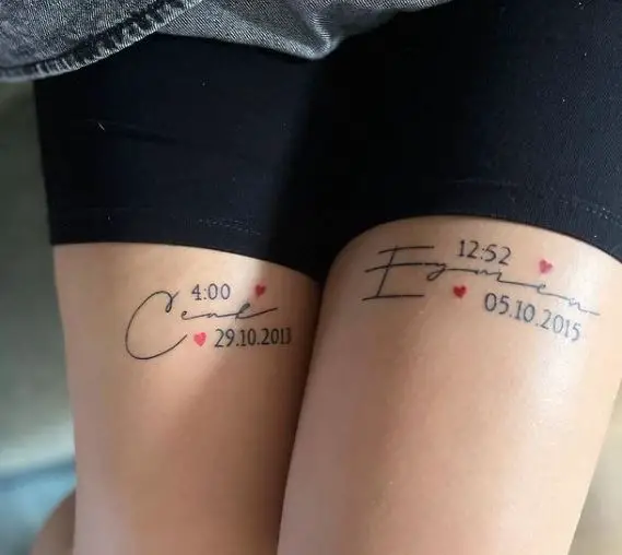 names and date tattoos on the thighs