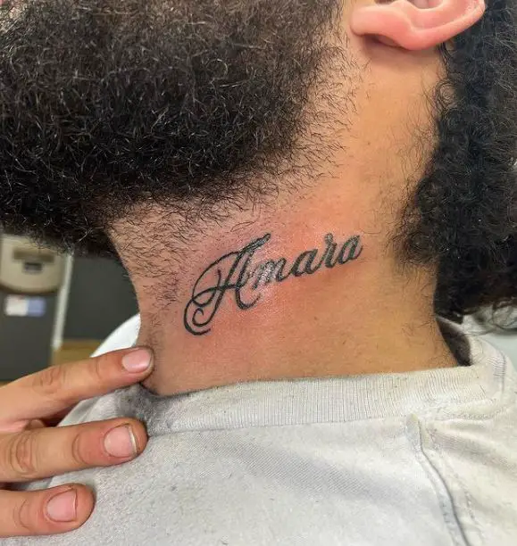 small name tattoo on the neck