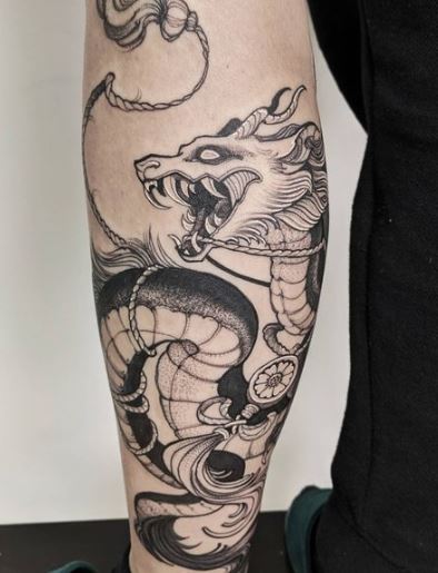 snake dragons with white lotus tattoo