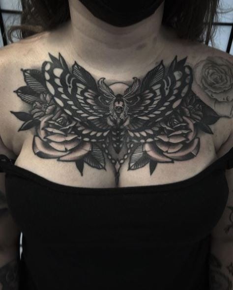 Black and Grey Roses and Death Moth Chest Tattoo