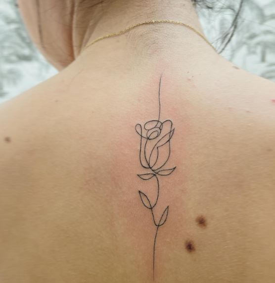 Finelined Rose Spine Tattoo