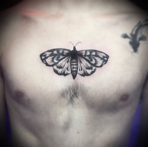 Black and Grey Little Moth Chest Tattoo