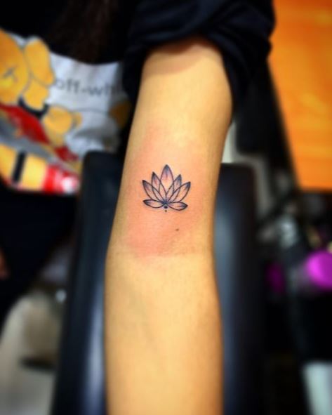 Minimalistic Lotus Flower Biceps Tattoo