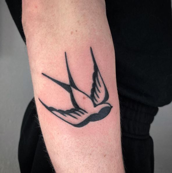 Black Swallow Forearm Tattoo