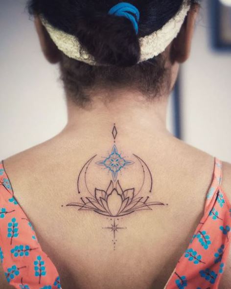 Ornaments and Lotus Flower Spine Tattoo