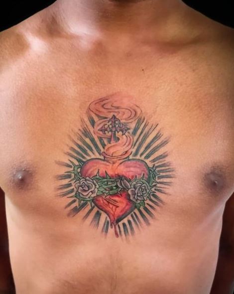 Flowers on Red Bleeding Sacred Heart Chest Tattoo