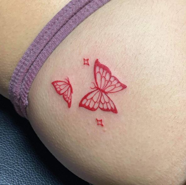 Small Red Butterflies Hip Tattoo