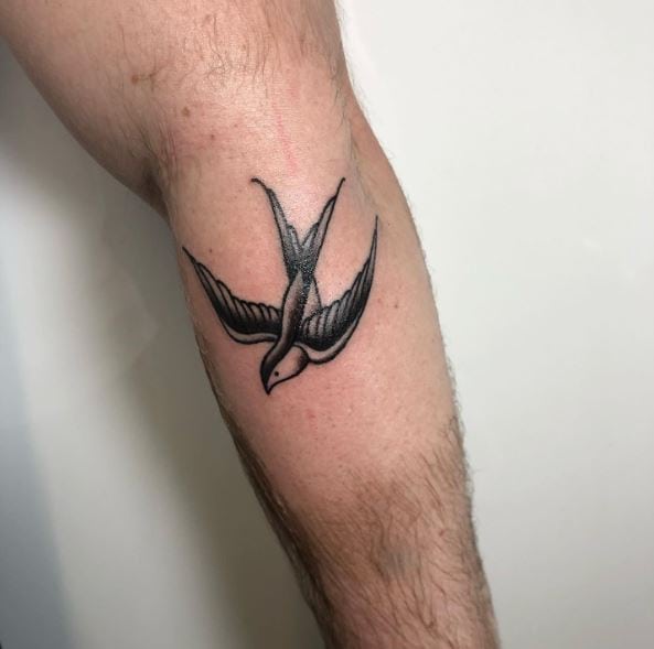 Black Inked Swallow Forearm Tattoo