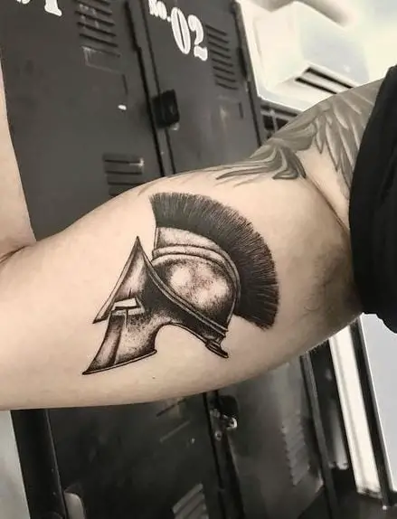 Black Spartan Helmet Biceps Tattoo