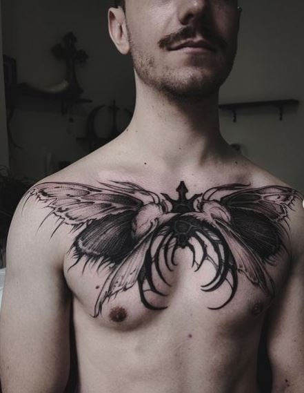 Black-Work Moth Chest Tattoo