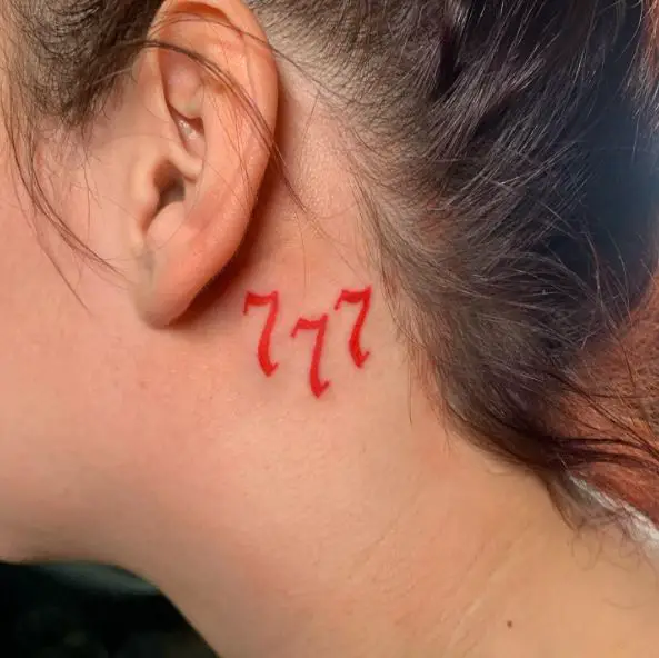 Red Minimalistic 777 behind Ear Tattoo