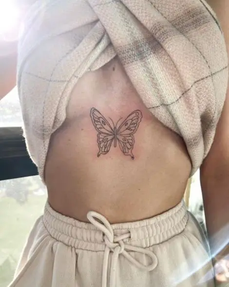 Butterfly Below Breasts Tattoo