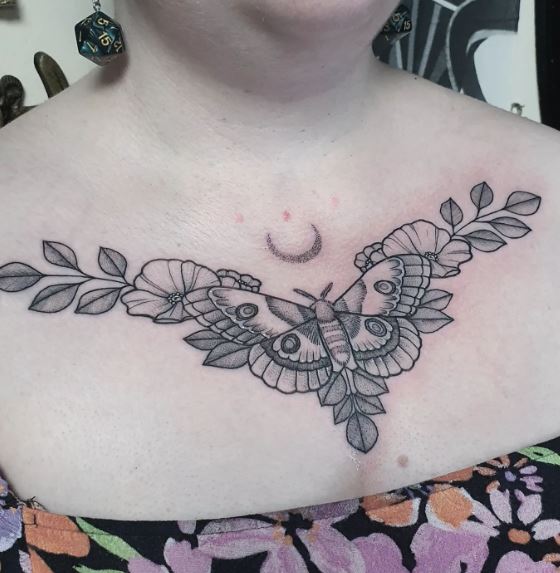 Big Grey Flowers and Moth Chest Tattoo