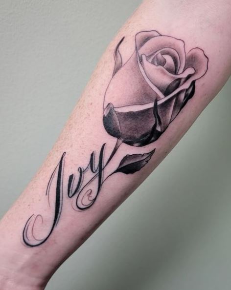 Shaded Grey Rose Bud and Name on Arm Tattoo