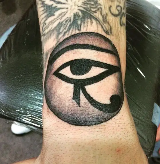 Blackwork Circled Eye of Horus Tattoo