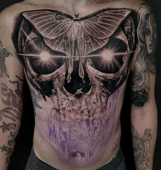 Black Skull Background Moth Chest Tattoo