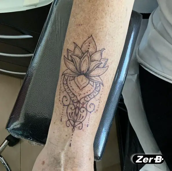 Ornamented Lotus Flower Forearm Tattoo