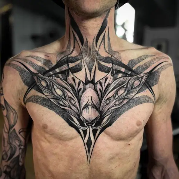 Big Black Moth Chest Tattoo