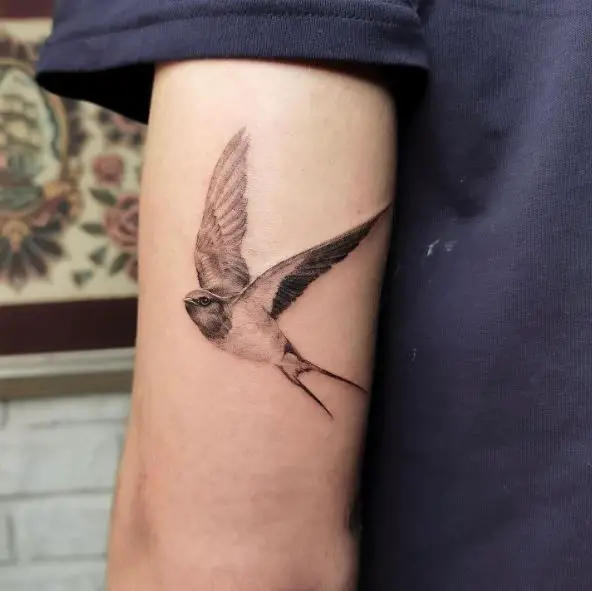 Flying Sparrow Arm Tattoo