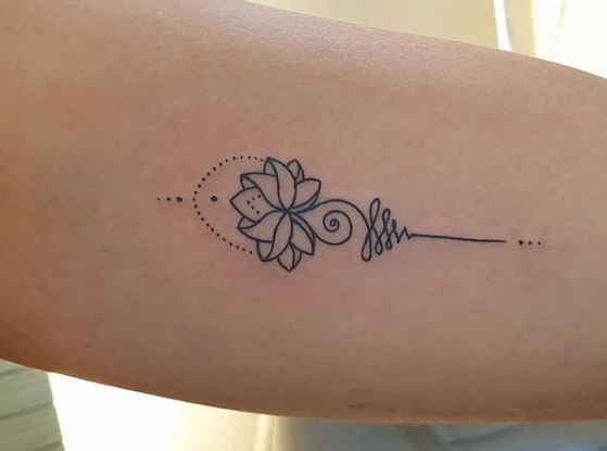 Minimalistic Lotus Flower Arm Tattoo