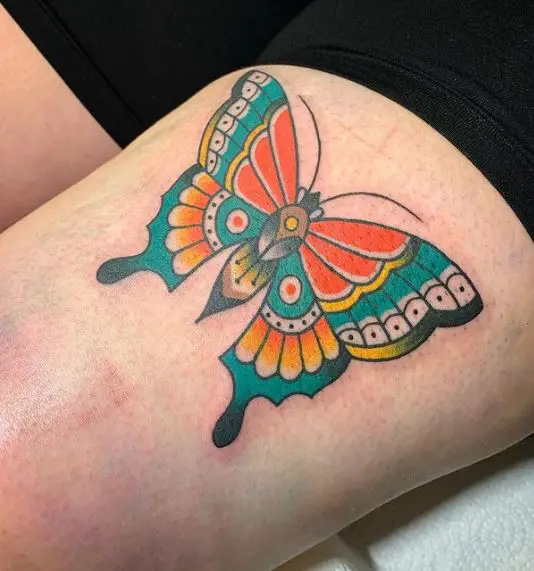 Big Colorful Butterfly Thigh Tattoo