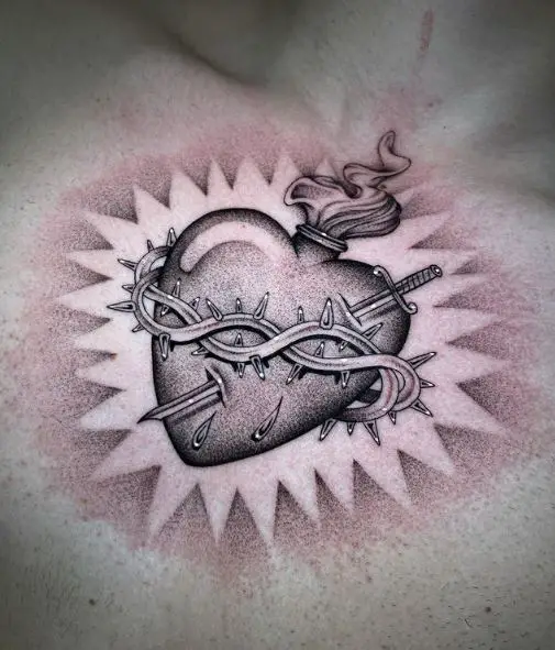 Stabbed Bleeding Sacred Heart Chest Tattoo