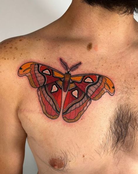 Red Atlas Moth Chest Tattoo