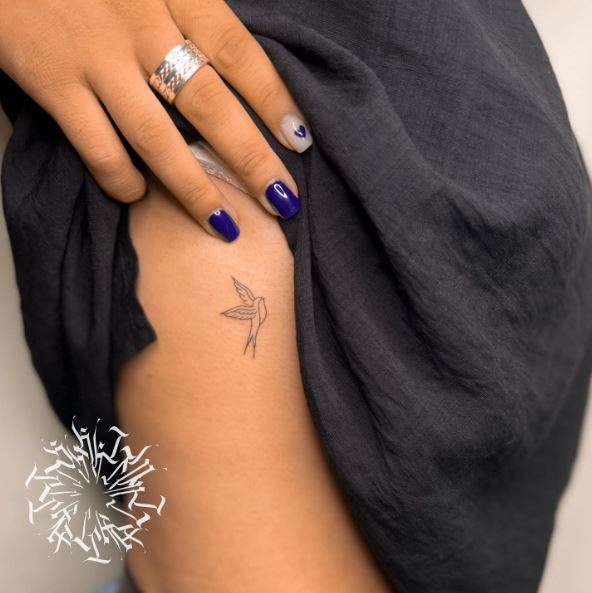 Small Flying Straight Up Swallow Tattoo