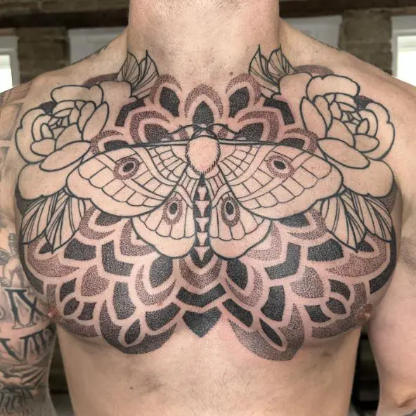 Line-Work Flowers and Moth Chest Tattoo